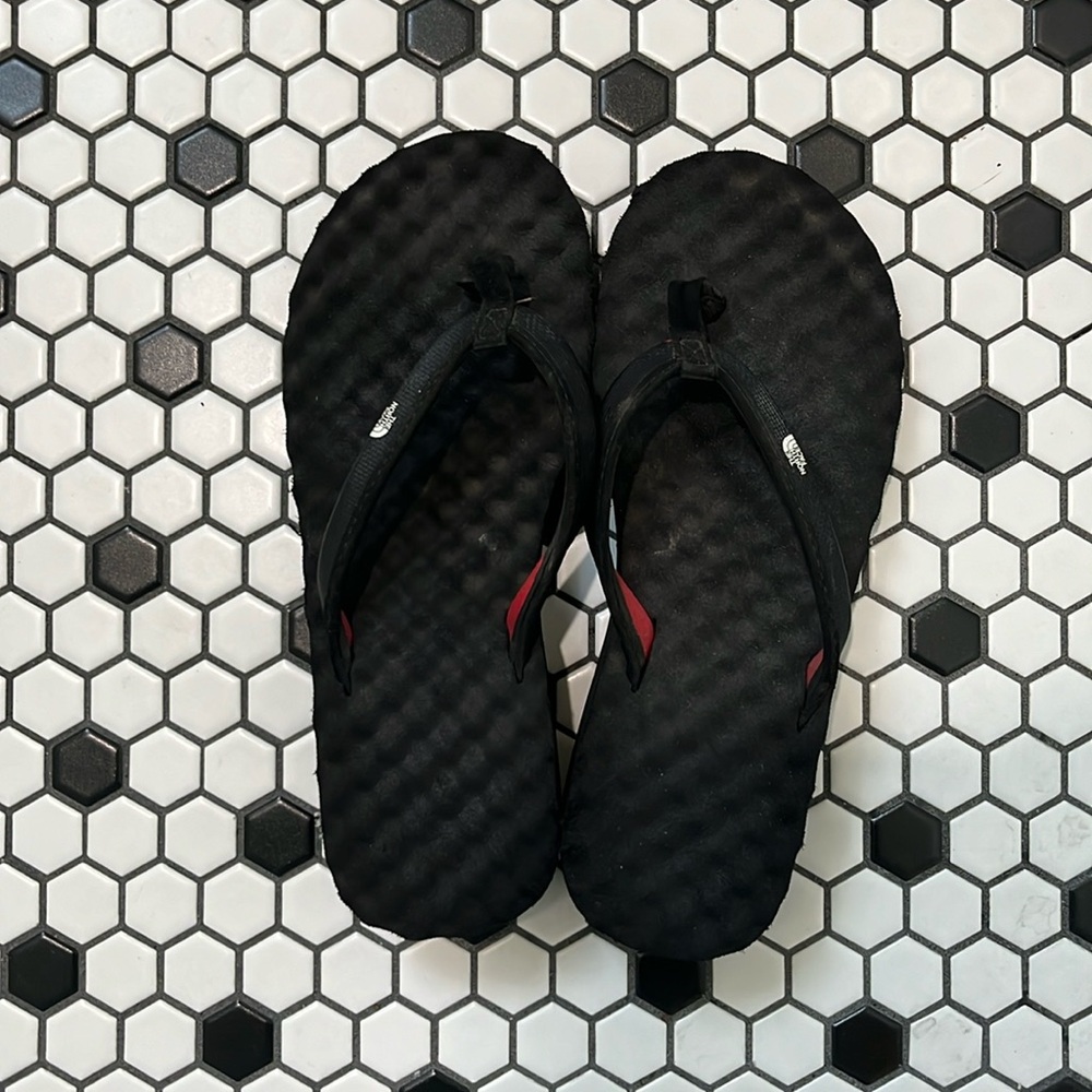 North Face flip flops.